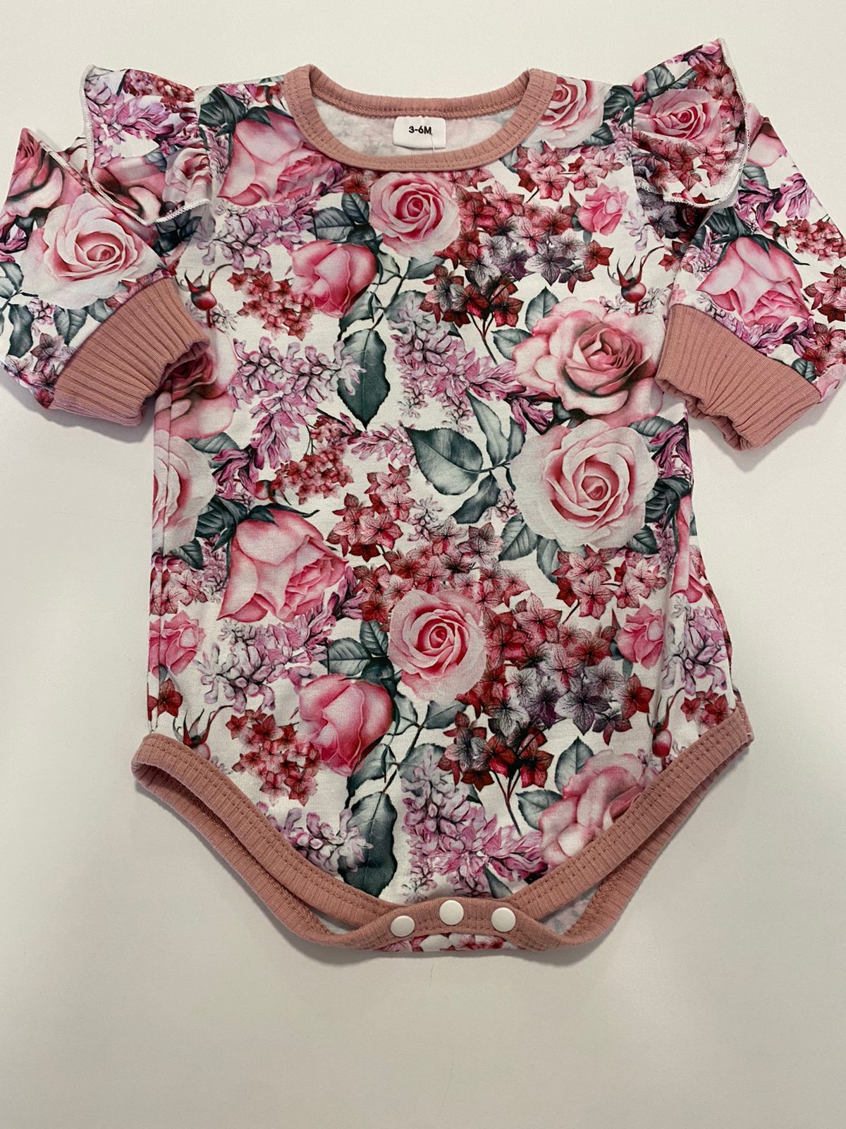 Body Estampado flores rosa e roxa