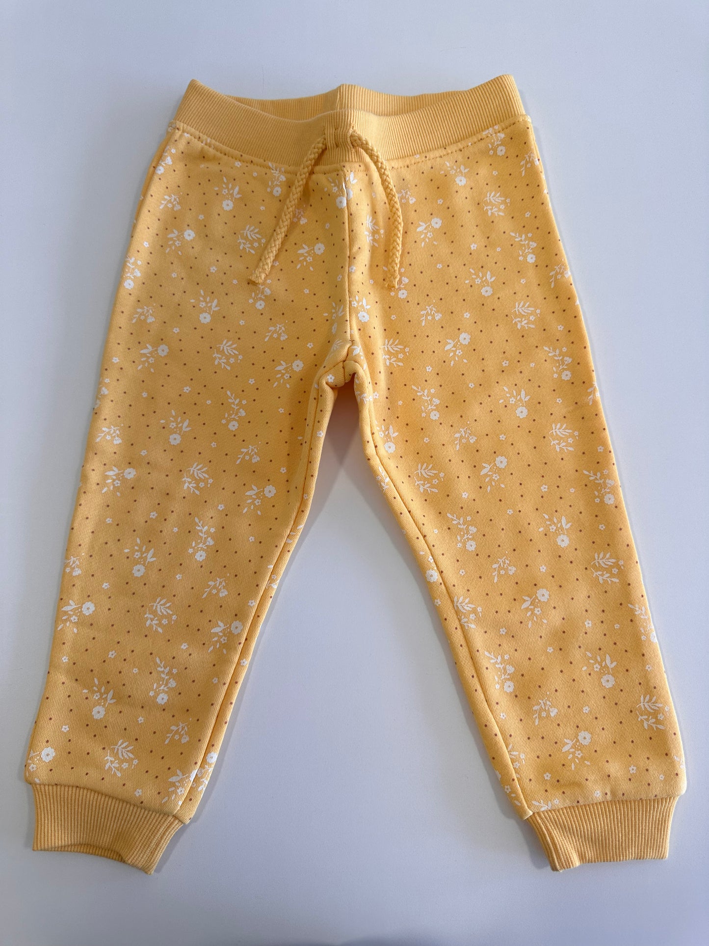 Calça moletom amarela floral