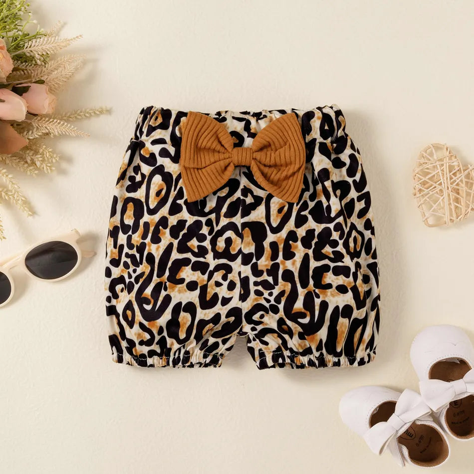 y Conjunto Marron e Shorts de Onça
