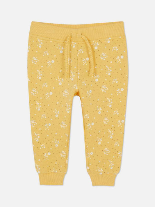 Calça moletom amarela floral